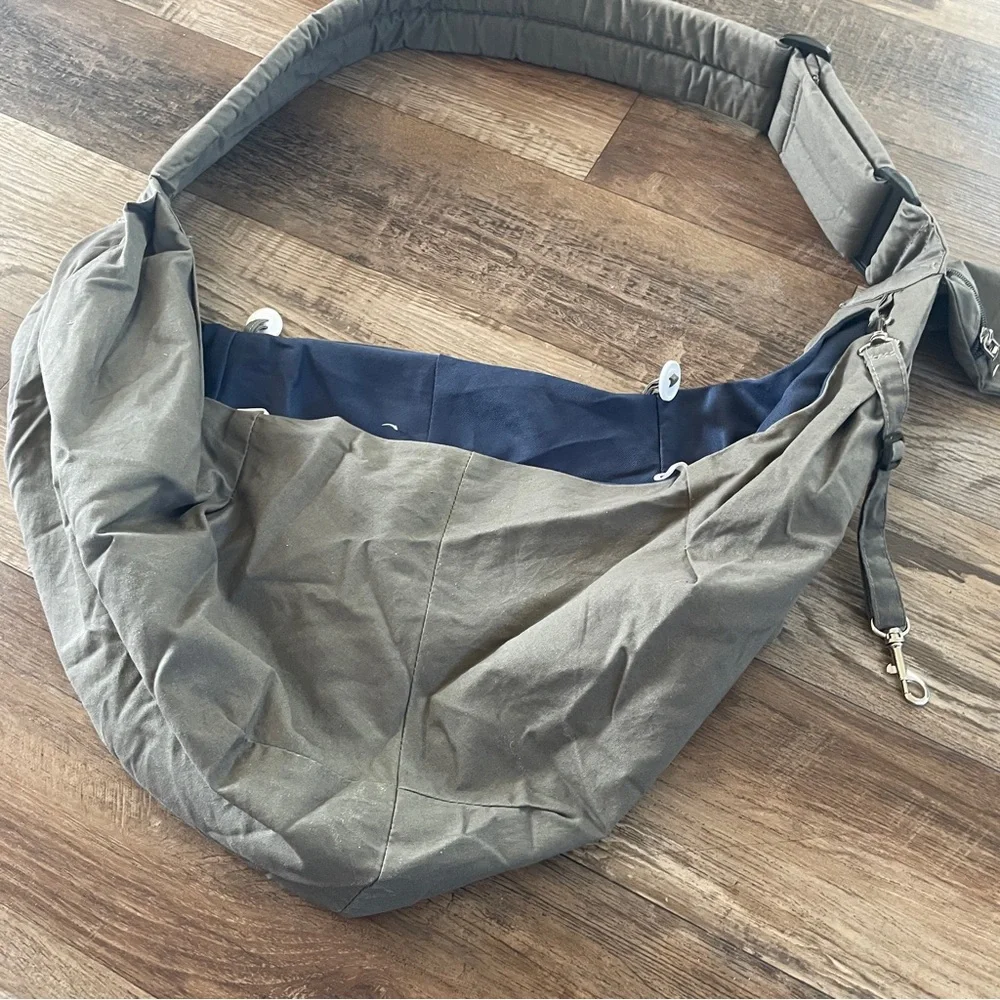 Slow pet, dog or cat sling carrier